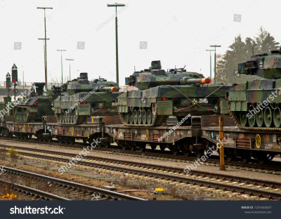 stock-photo-schwandorf-germany-november-cargo-train-transports-german-tanks-leopard-on-a-1231634437.jpg